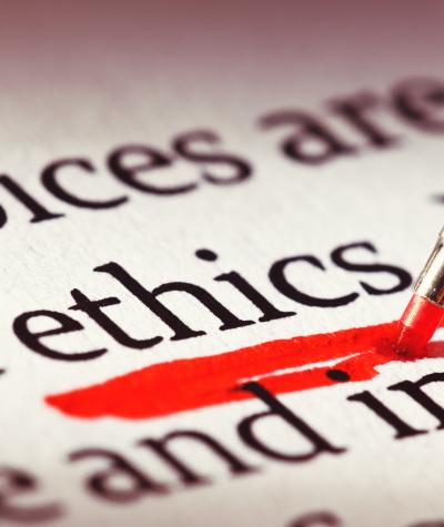 Red pen underlining the word "ethics"