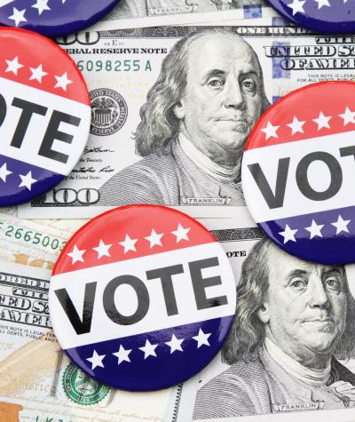 "VOTE" buttons on 100 dollar bills.