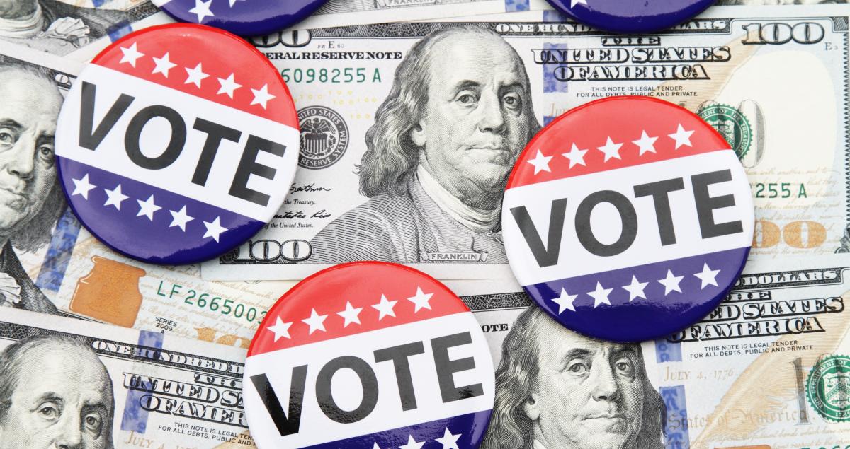 "VOTE" buttons on 100 dollar bills.